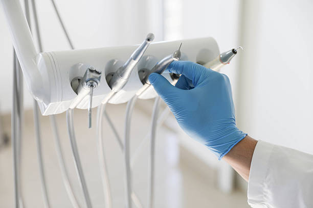 Professional Invisalign Clear Aligners technician working in Hudson, MI